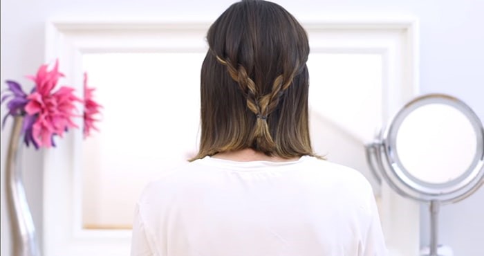 Peinados para invitadas de boda de trenzas de cordón en ambos lados